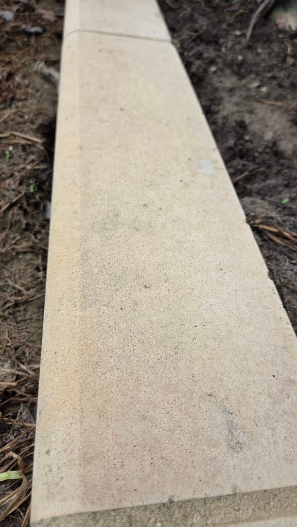 Garden edging after algae removal and pressure cleaning in Perth